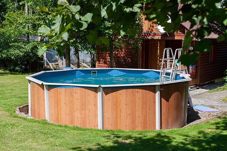 Picture of a small, round outdoor, above ground swimming pool