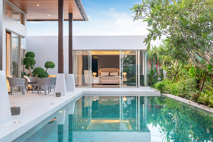 Picture of a house with an outdoor swimming pool