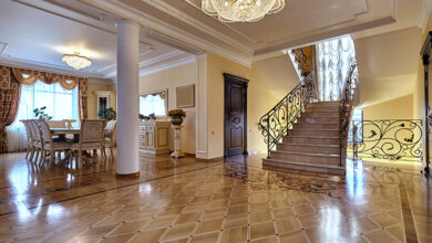 Picture of a large hallway with staircase