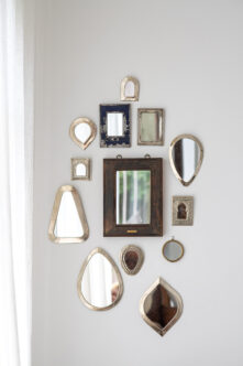 Picture of several small mirrors on a wall