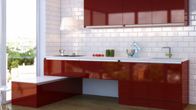 Picture of a red glossy kitchen with wooden floors