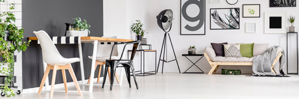 Picture of a living room with a black, lime and white colour scheme