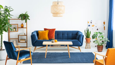 Picture of a living room with orange and blue colour scheme