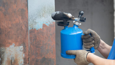 Picture of rust treatment being applied to a wall