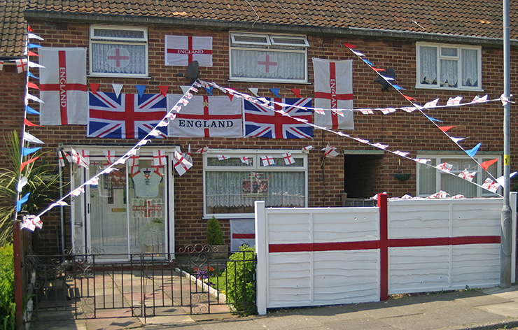 Photo of a British house decorated with England flags and bunting