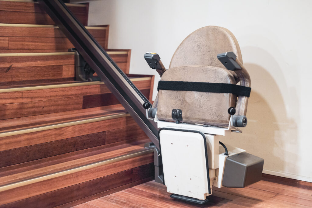 Picture of a stairlift on wooden stairs