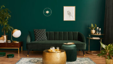Picture of a dark green living room with matching furniture