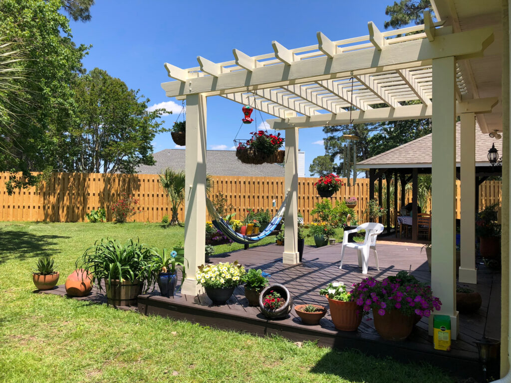 Picture of a garden with a wooden pergola
