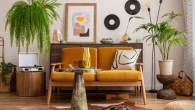 Picture of a living room with vintage decor and colourful sofa