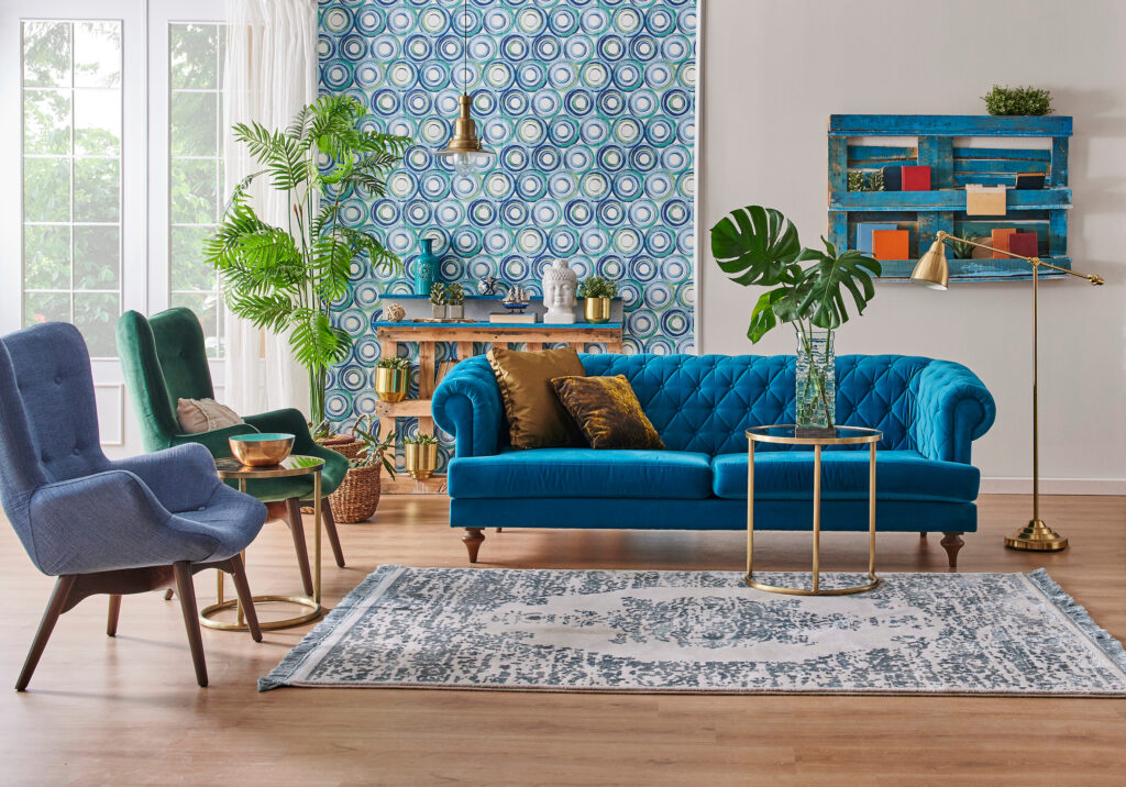 Picture of a living room with blue wallpaper