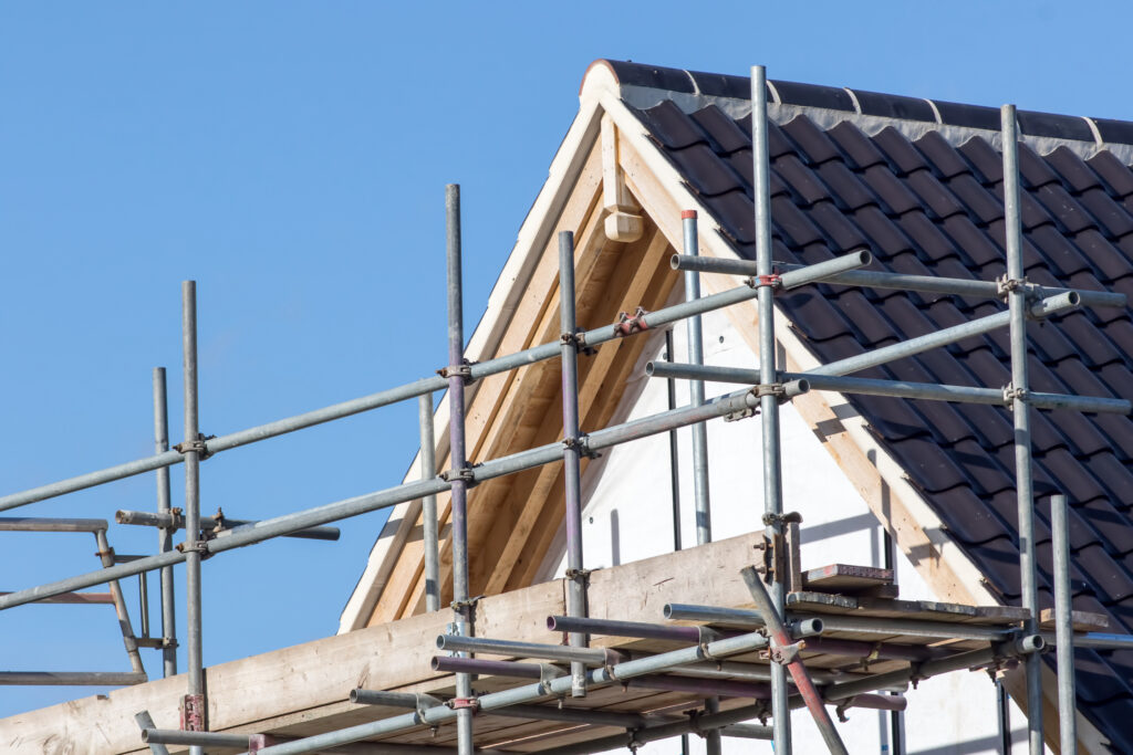 Picture of a house with scaffolding on it