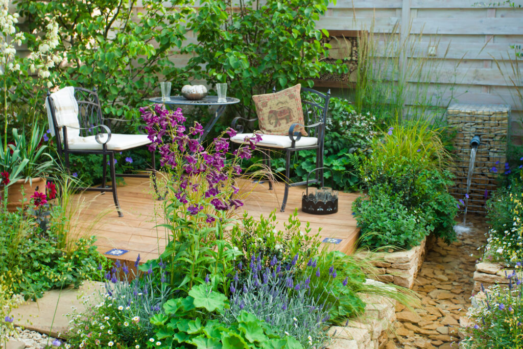 Picture of a garden with water feature and outdoor seating on patio