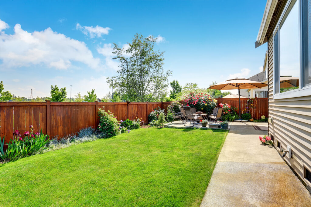 Picture of a garden with lawn and patio