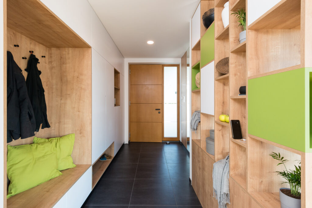Picture of a hallway with custom built storage in walls