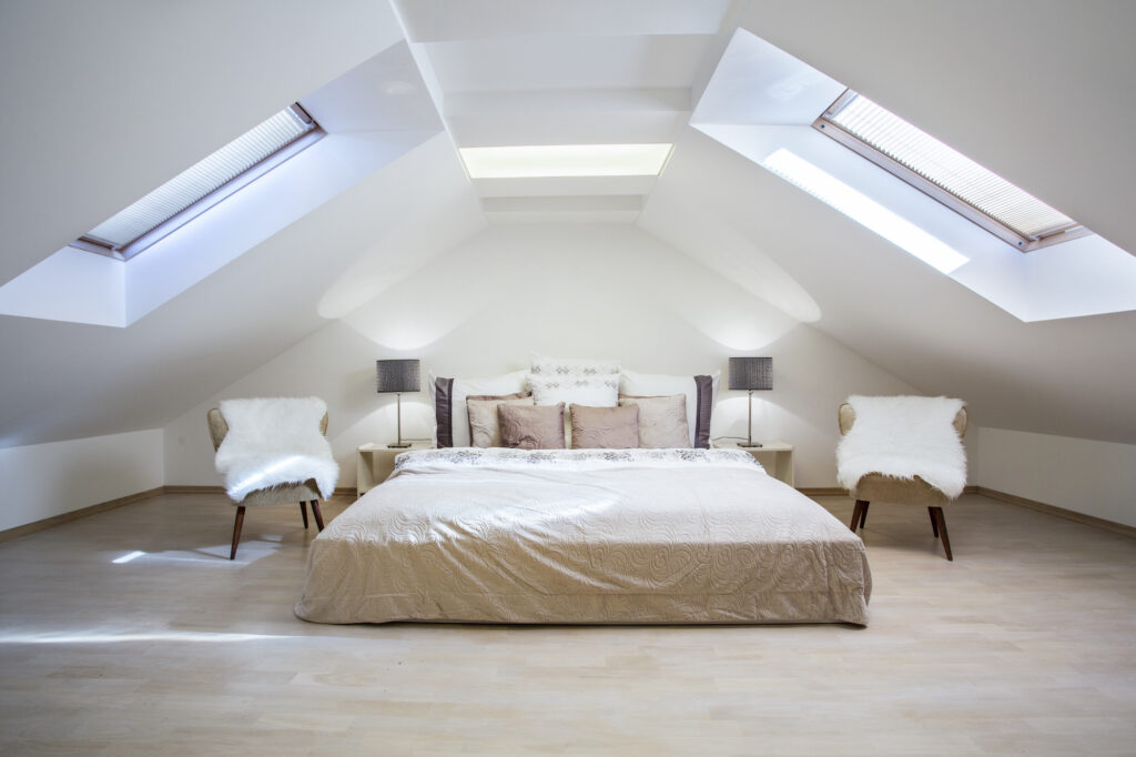 Picture of a loft window with two large velux skylight windows